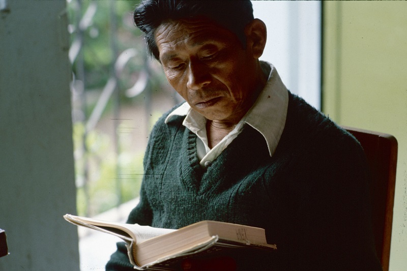 A Cakchiquel man reads a Bible A Cakchiquel man reads a Bible
